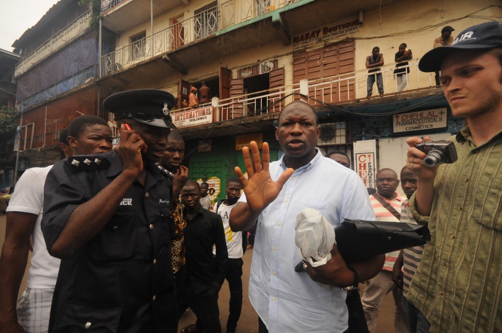 People gathered on the street in Sierra Leone.